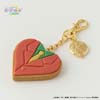 zawieszka do torby w kształcie serca imitujący ciastko z lukrowaniem w formie garnituru Seiyego