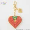zawieszka do torby w kształcie serca imitujący ciastko z lukrowaniem w formie garnituru Seiyego z przodu